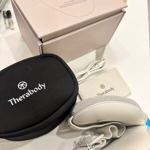 Therabody Device with Black and Gray Accessories